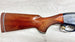 Fine wood stock shotgun with engraved receiver, ideal for hunting or collection