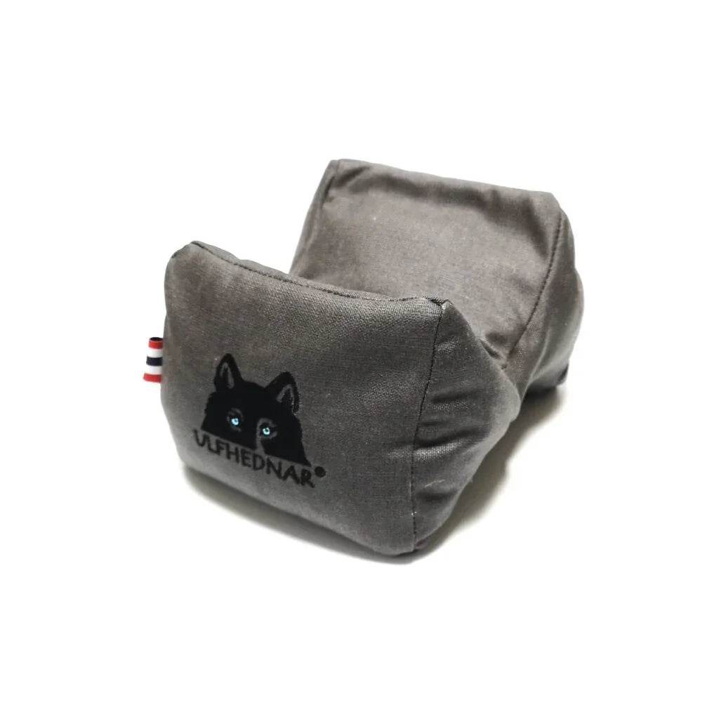 Grey Vlfhednar shooting sandbag with wolf logo, for precision rifle support and target practice.