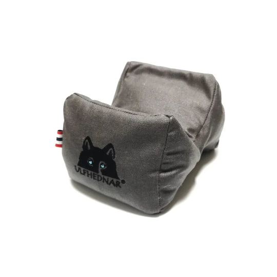 Grey Vlfhednar shooting sandbag with wolf logo, for precision rifle support and target practice.
