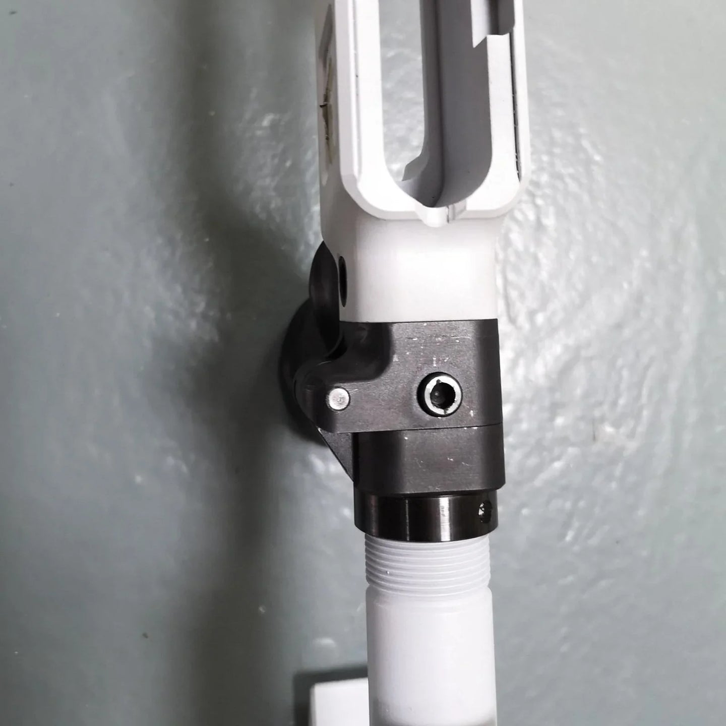 White competition rifle stock with adjustable black cheek rest for precision shooting