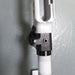 White competition rifle stock with adjustable black cheek rest for precision shooting