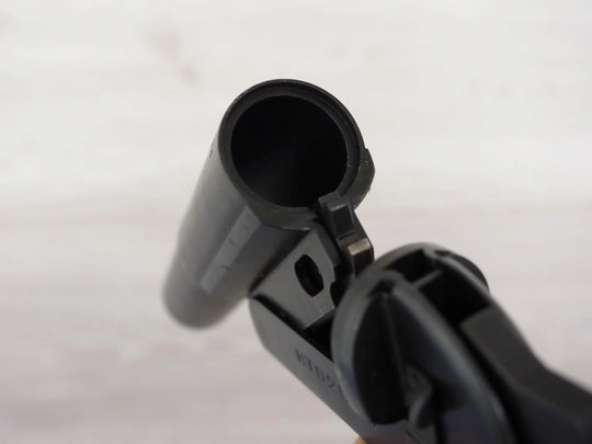 Close-up of a black revolver barrel and cylinder, ideal for sport shooting and hunting.