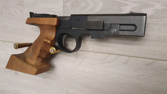 Made in Italy competition pistol with wooden grip, ideal for target shooting and collectors